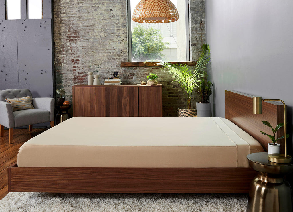 The khaki sheets by Sheex fit snugly around your mattress.