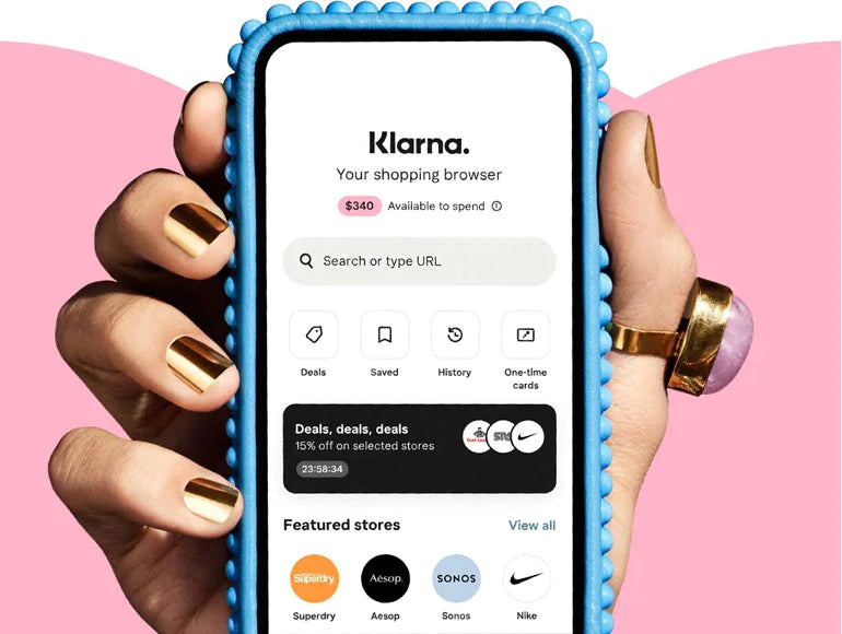 Klarna financing image with hand holding cell phone